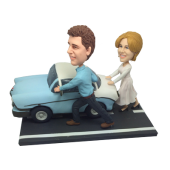 Couple Pushing Car