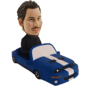 Man in Blue Car