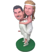 Piggybacking Wedding Cake Topper